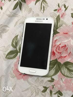Samsung galaxy grand z with charger, earphones