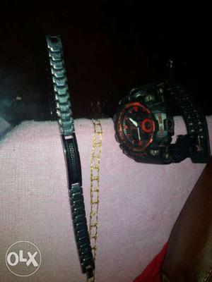 Silver ID Bracelet and G shock watch