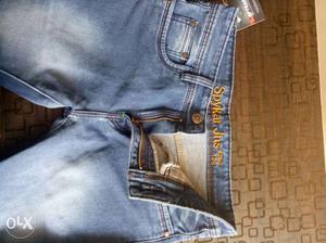 Spyker jeans and Versace at 900... available size