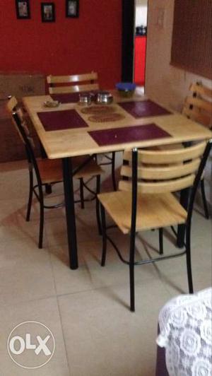 4 seater Dinning table in good condition for sale.