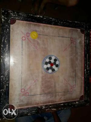 Black And Brown Carrom Board Game
