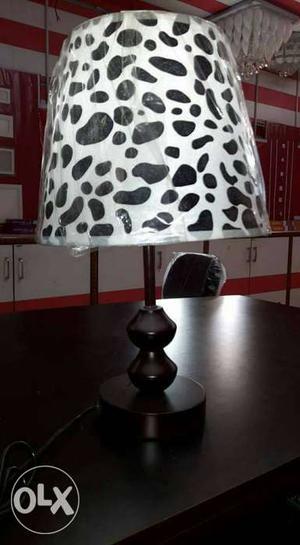 Brown Stand And White And Black Shade Table Lamp Lights