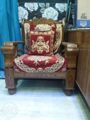 Brown Wooden Framed Red And Brown Floral Padded Armchair