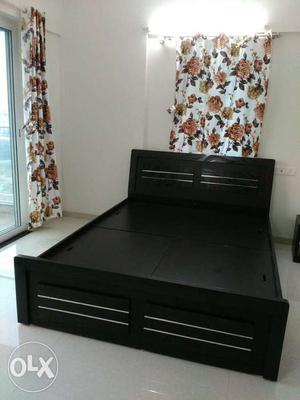 Double size bed with trolley storage very nice