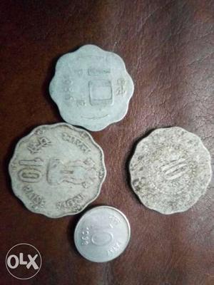 Four different antique 10 paisa coin