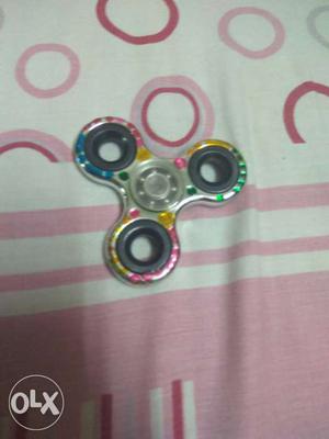 Gray, Green, And Yellow Fidget Hand Spinner