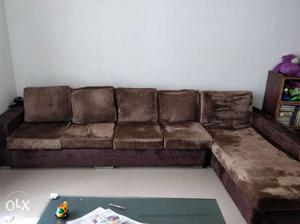 L shape 6 seatter sofa with 2 puffy