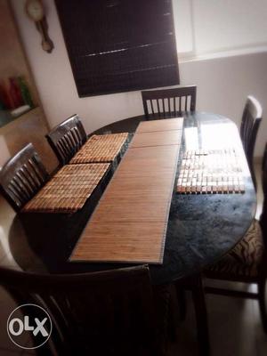 Oblong Brown Wooden Table With Six Padded Chairs Dining Set