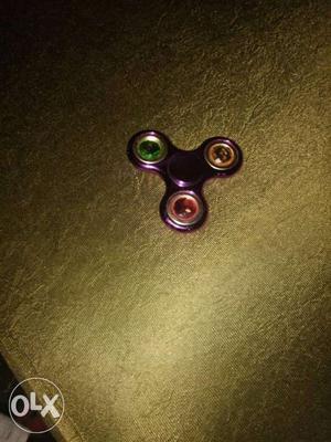 Purple, Red, And Green 3-bladed Fidget Spinner