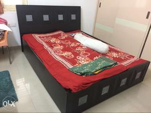 Queen size bed with branded mattress