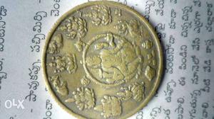 Round Embossed Gold Coin