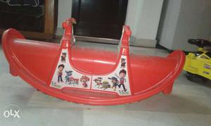 Toddlere's Red Plastic Seesaw