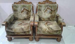 Two Brown Wood-framed Floral Padded Sofa Chairs. No.