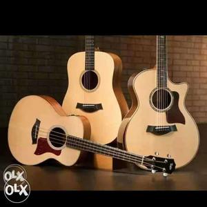 Two Cut-away Acoustic Guitars