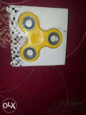 Yellow Three-bladed Fidget Spinner In Box