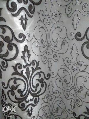 2 Sets of Black and white curtains with sequence work on