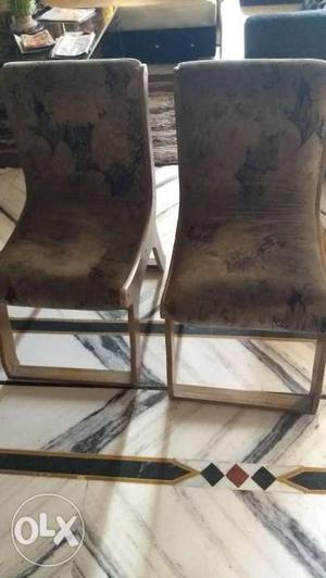 2 wooden upholstery chairs in good condition very