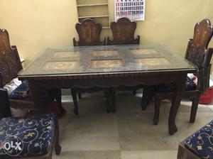 6 seater intricately Carved wooden Dinning Table