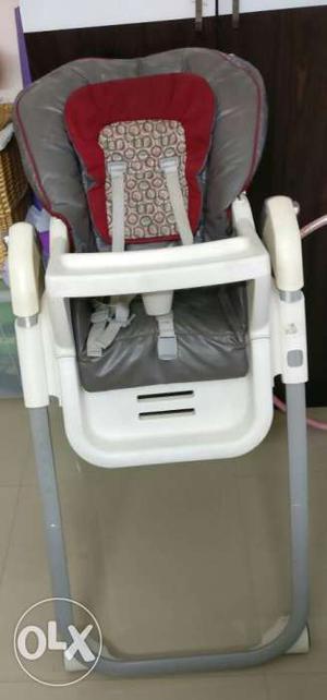 Baby's White And Gray Highchair
