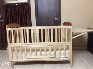 Beige Wooden Crib with Mattress