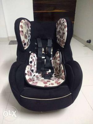 Black, White And Brown Car Seat