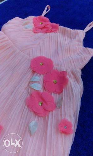Brand New Imported Baby Frock In Peach Colour.