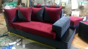 Gray And Red Suede Sofa With Four Pillows