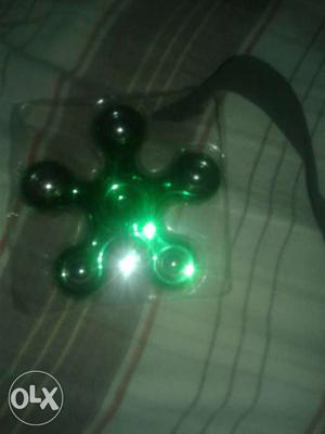 Green Metallic Spinner Fidget Toy
