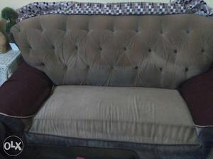 Grey And Brown Tufted Sofa..8seater,used only for 2-3