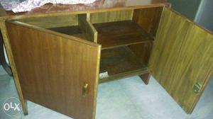Newly polished wooden cabinet about 60 percent