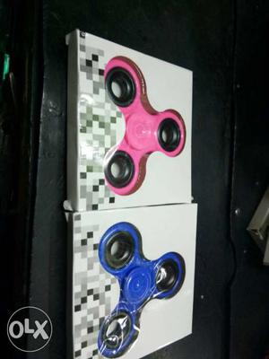 Pink And Blue Fidget Hand Spinners In Box