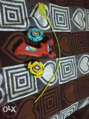 Red, Blue, And Yellow Beyblade Toy