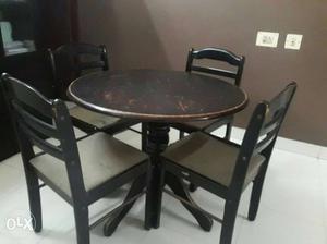 Round Black Wooden Pedestal Table With Padded Chairs Dining