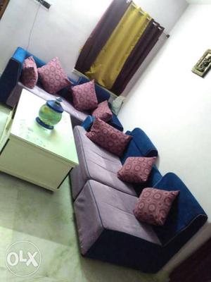 Sofa & tea table with sofa cover very good i want to sell