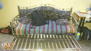 Stainless Steel Futon With Pink Suede Striped Pad