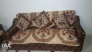This is teak wood 5 seated sofa with cursions for sale.