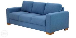 Three Seater Sofa in Aegean Blue Color by CasaCraft with