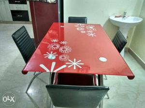 Used 4 seater dining table in good condition.