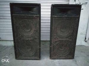 2 boxes containing 4 - 12" speakers with 2 - hise