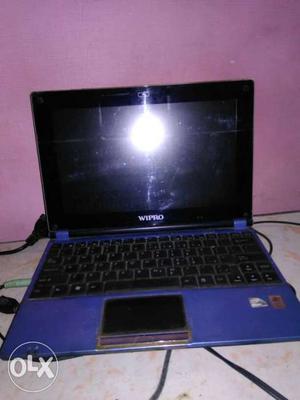 Black And Blue Wipro Laptop