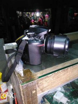 Black And Grey DSLR Camera
