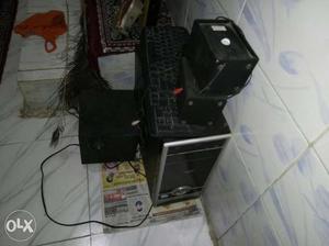 Black Computer Tower, Keyboard And Speaker