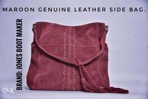 Imported genuine leather side bag.