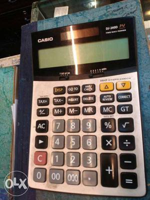 Silver And Black Casio Calculator