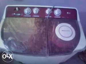 White And Maroon Twin Tub Clothes Washer
