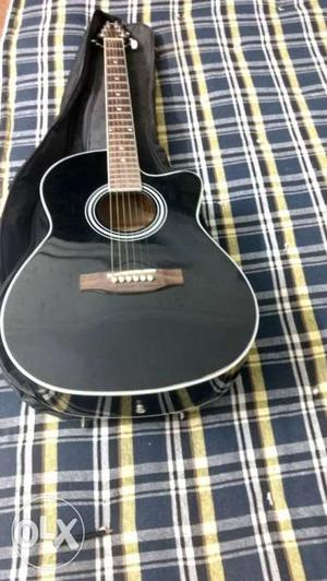 Ashton acoustic guitar 2 years old.. Market price