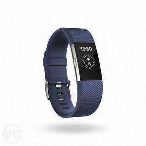 Black And Gray Fitbit Charge Hr