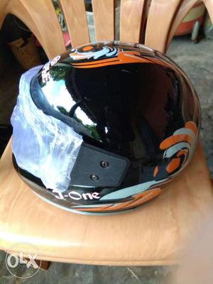 Black, White And Orange Full-face Motorcycle Helmet