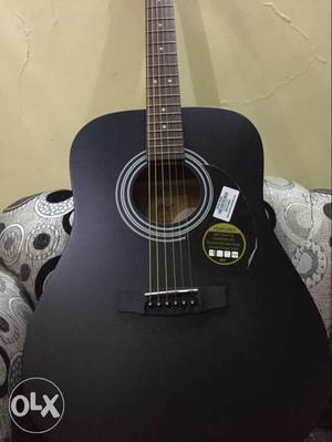 Brand new guitar by cort company. With brand new tuner and