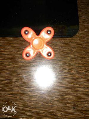 Orange 4-blade Fidget Spinner